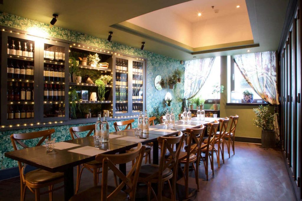 an intimate private dining room, with wine cellar