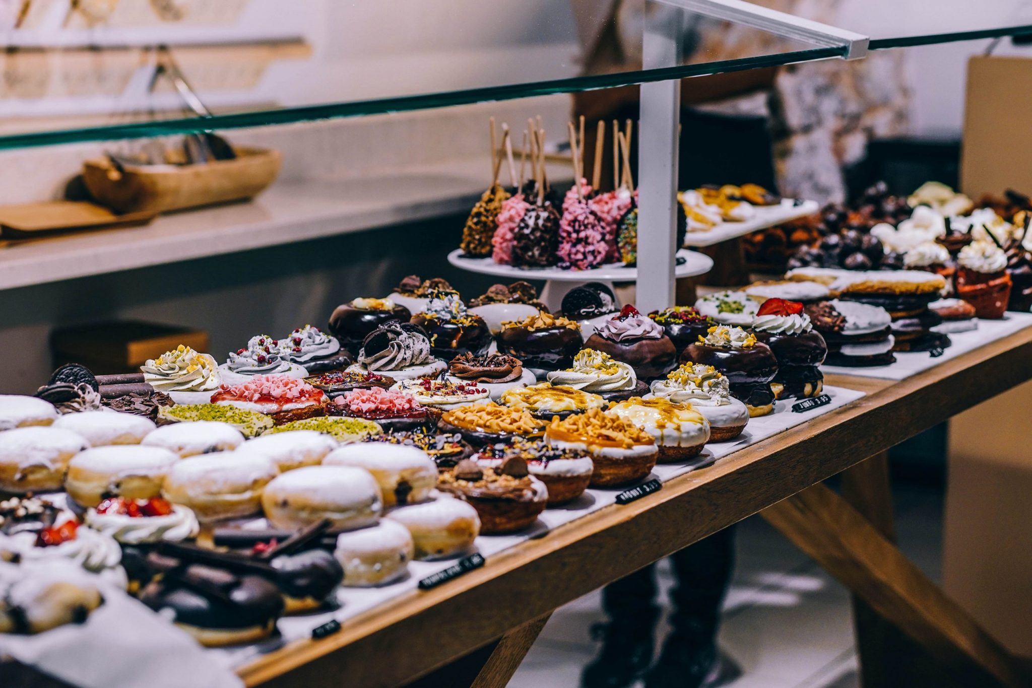 delicious desserts lined up at a dessert bar