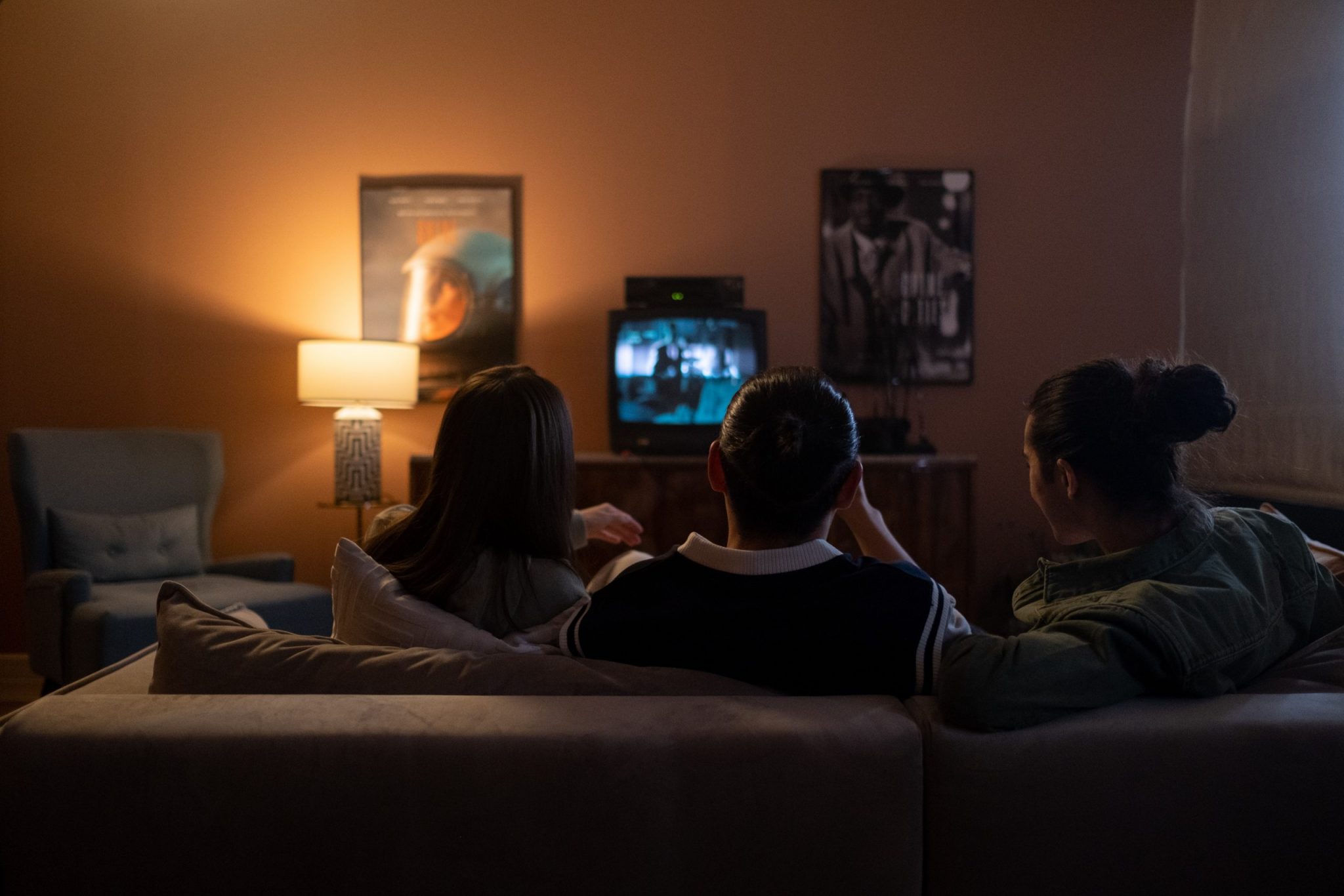 people enjoying an at-home movie night