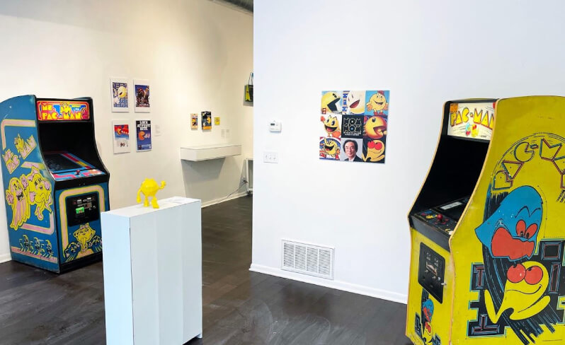 Pac-man display in a video games museum, including arcade games.