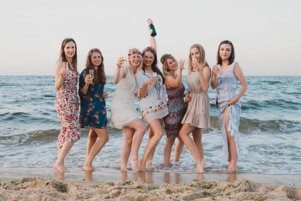 group of woman on a beach