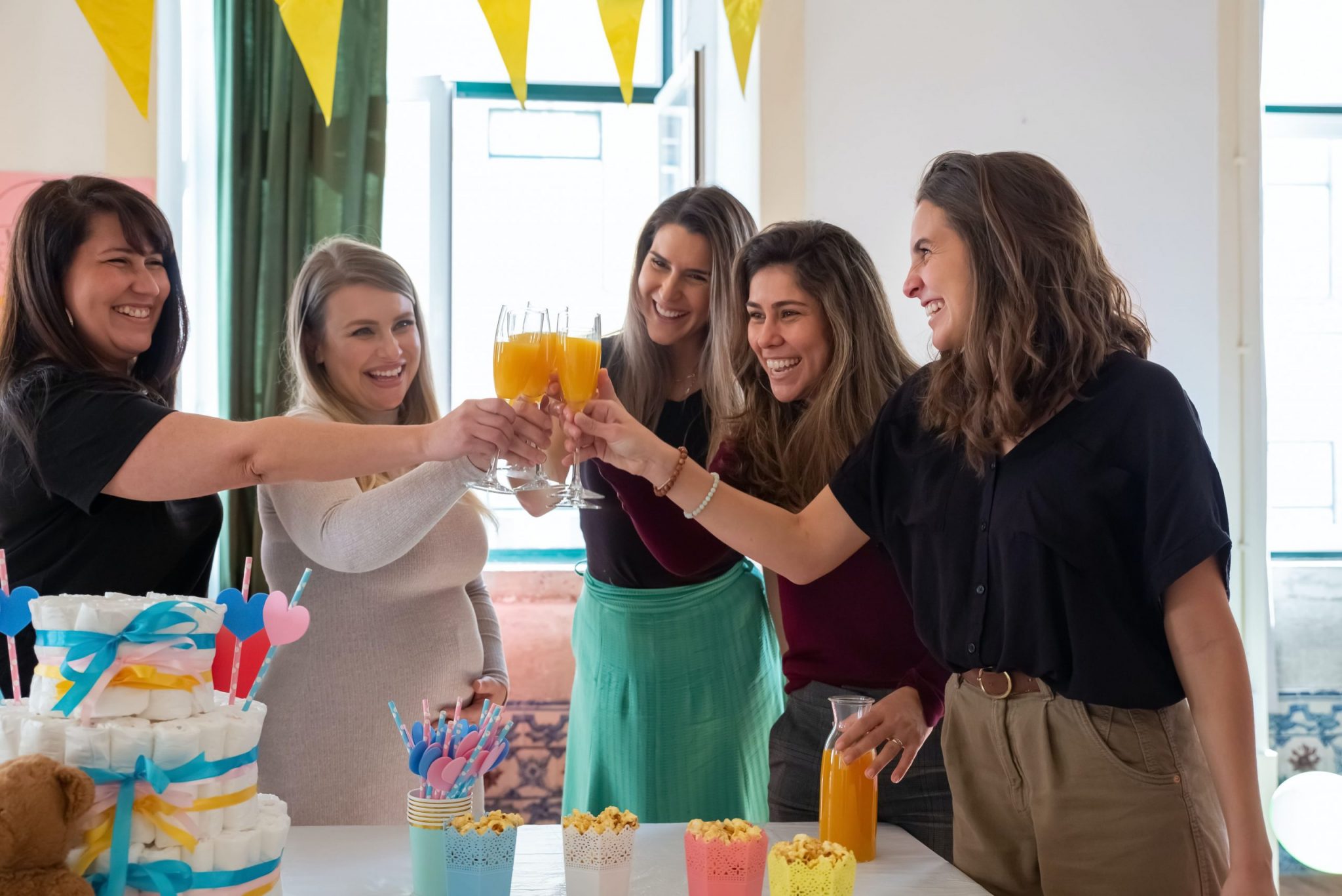 rainbow themed baby shower set up