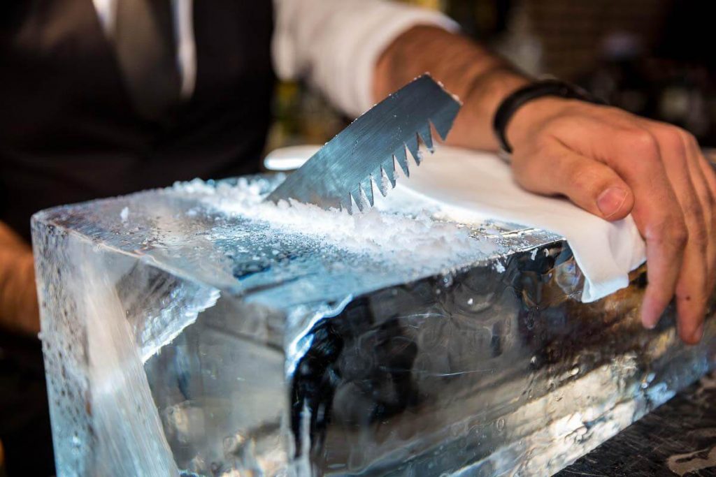 cutting a block of ice