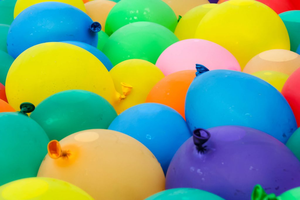 colorful ballons filled with water for water balloon toss game