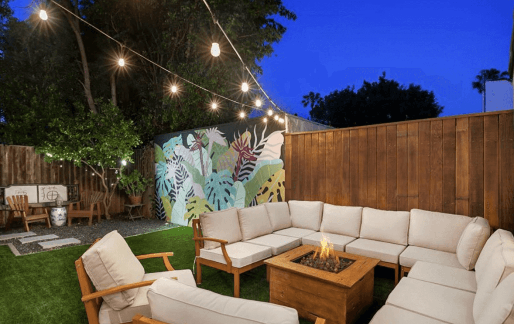 backyard with sofas and a fire pit