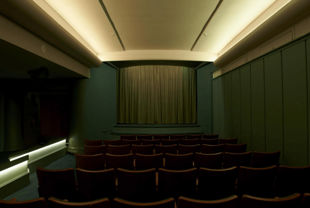 Dimly lit small cinema room