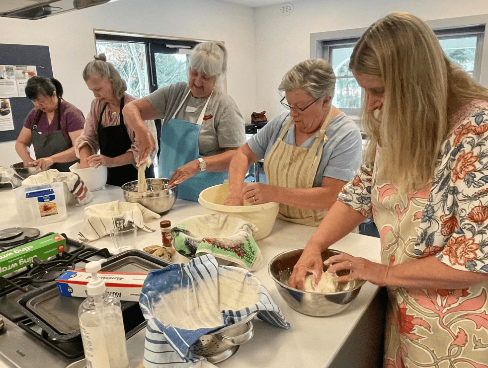 A group of people during a cooking workshop