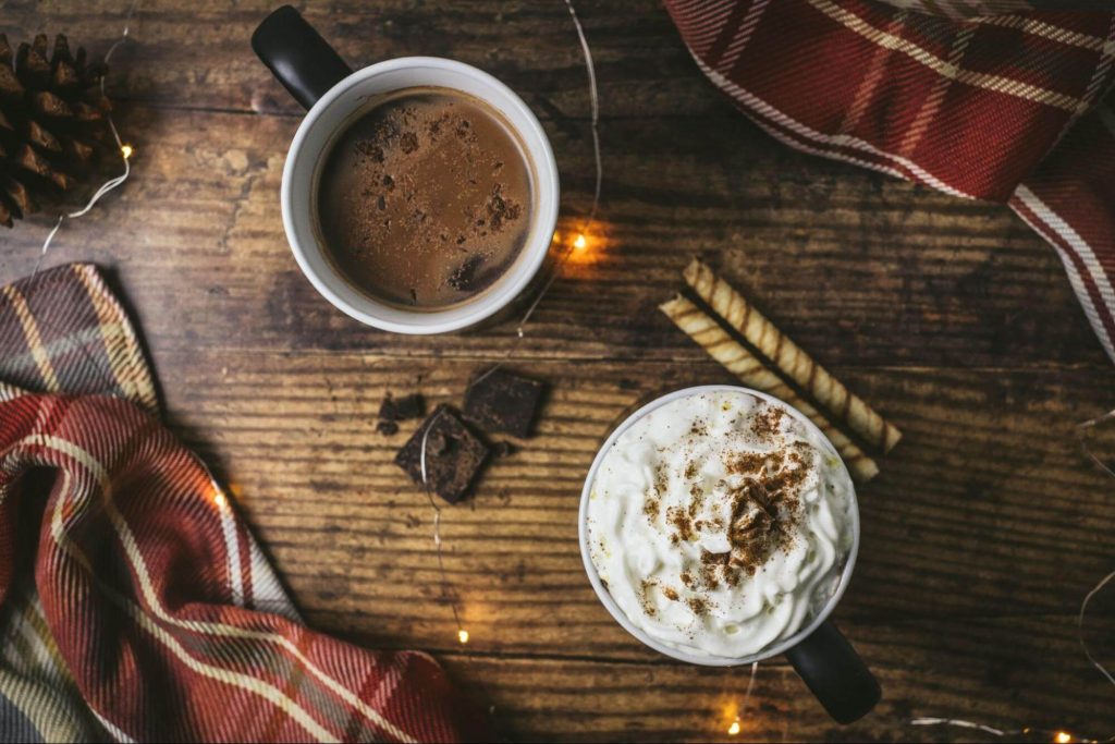 hot chocolate mugs on the wooden table