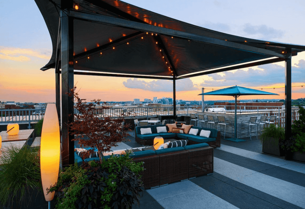 A rooftop bar overlooking Washington DC during sunset