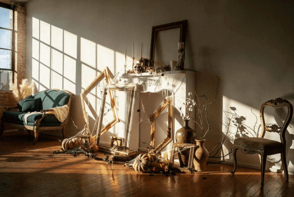 a photo studio decorated for a fall/halloween photo shoot