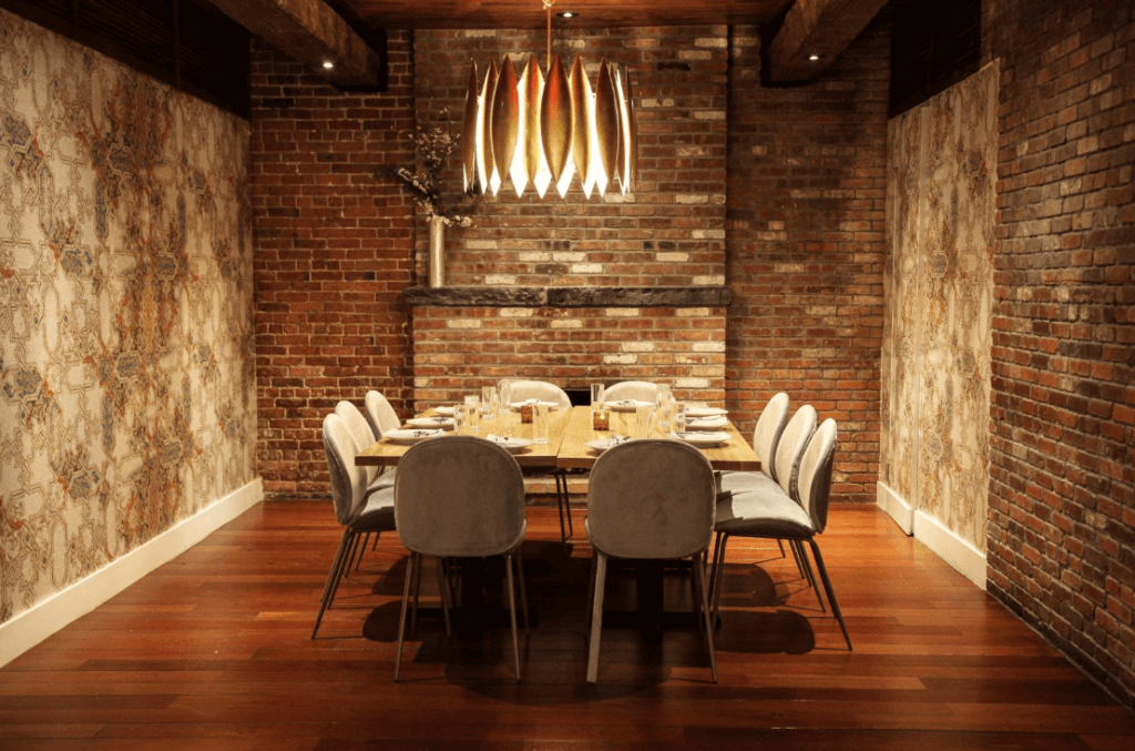 a private dining room set up for a dinner