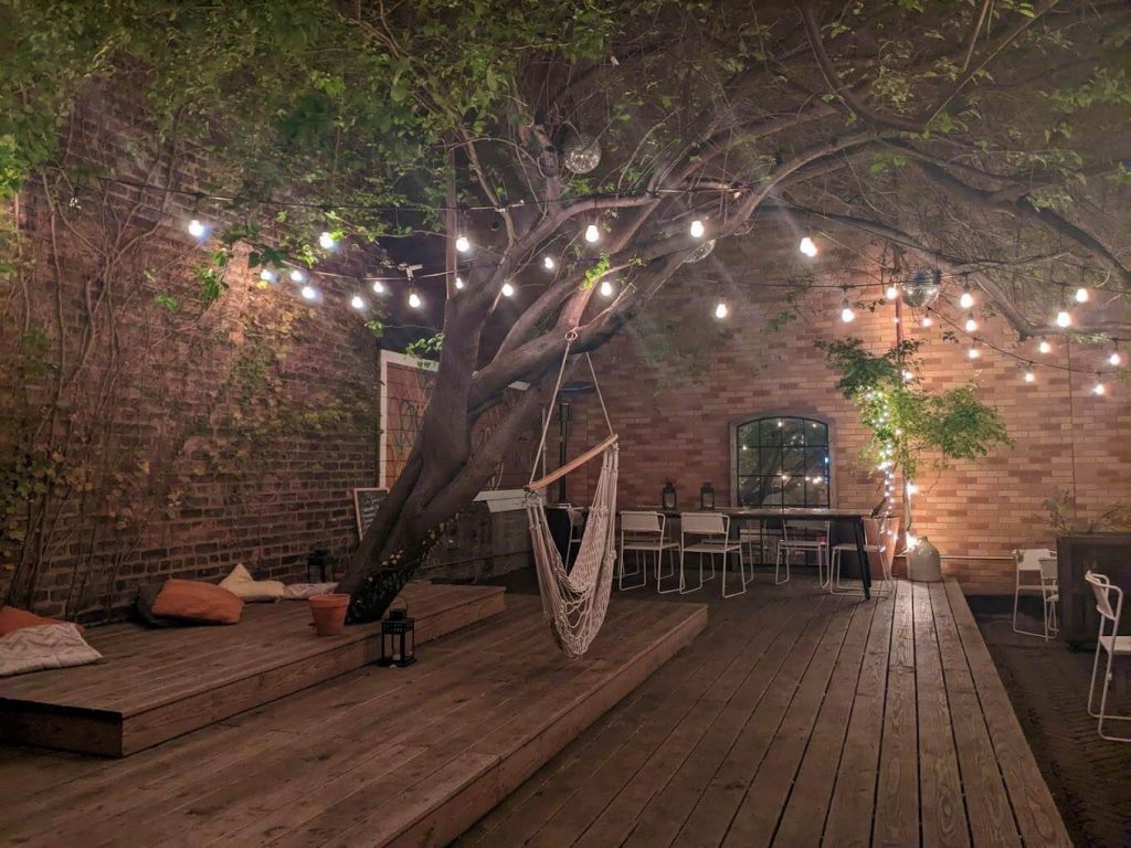 Enjoy the night sky in NYC in the beautiful outdoor garden at Sauced