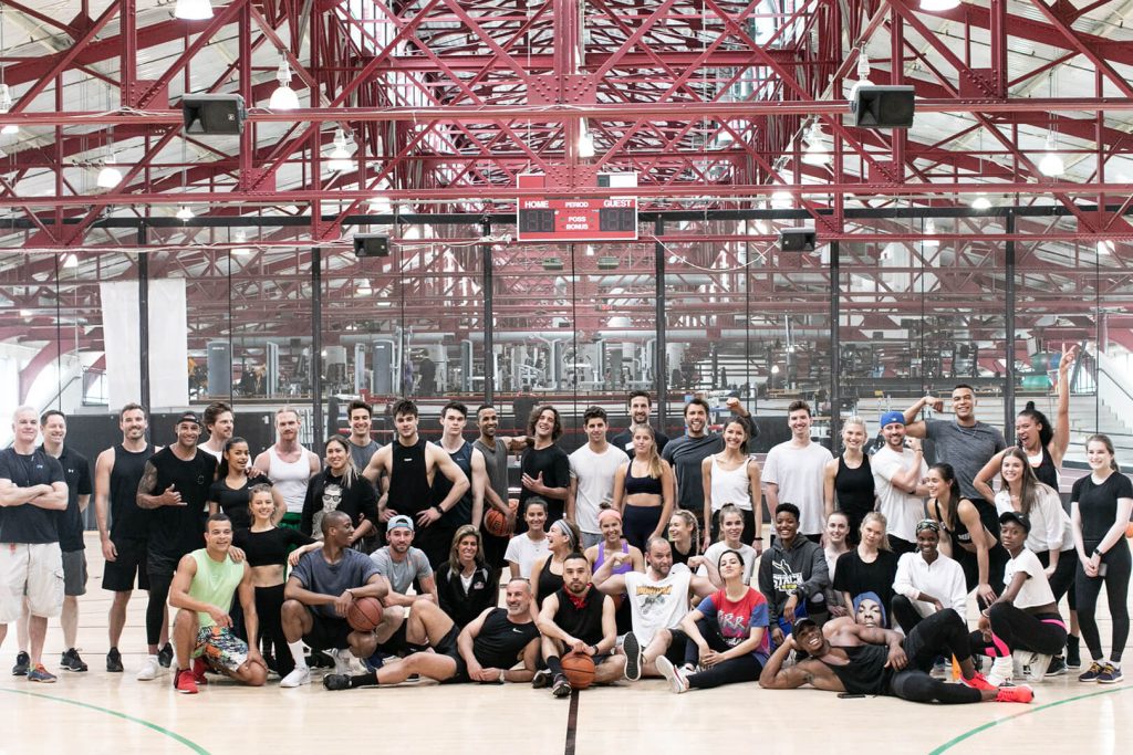 a group of people posing at chelsea piers 