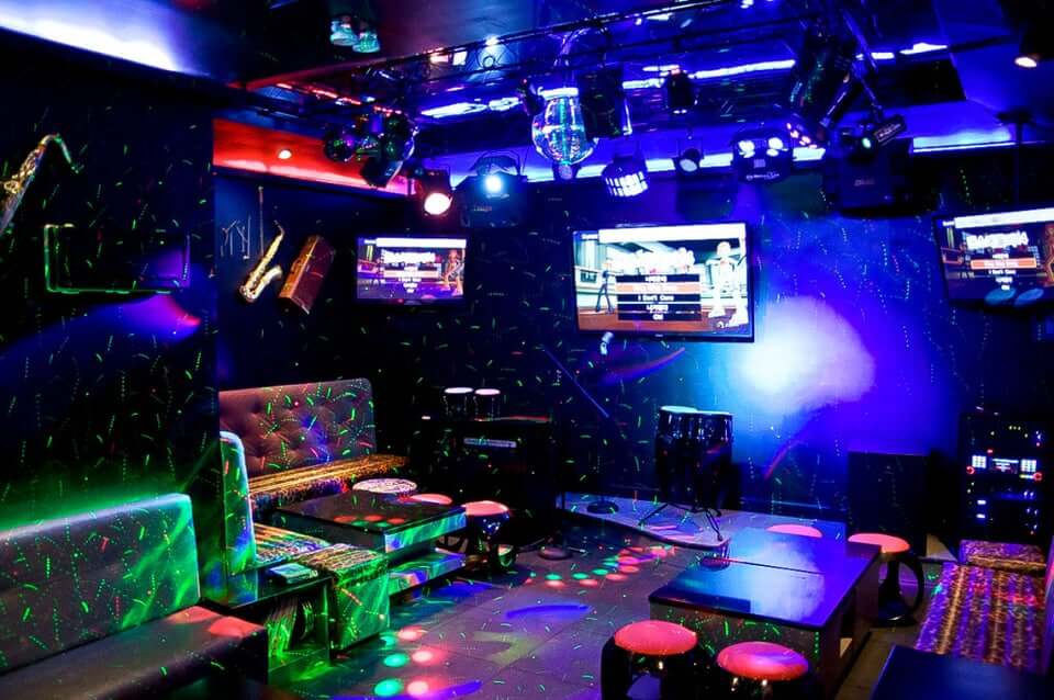 A colorful karaoke room