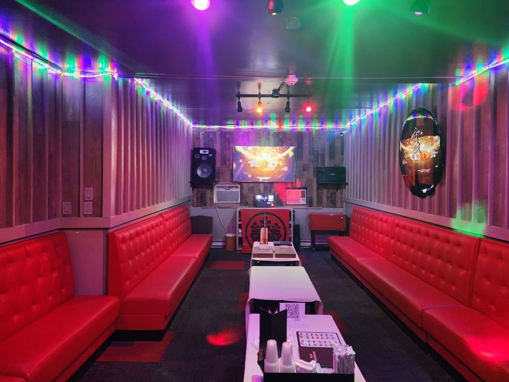 a colorful karaoke room