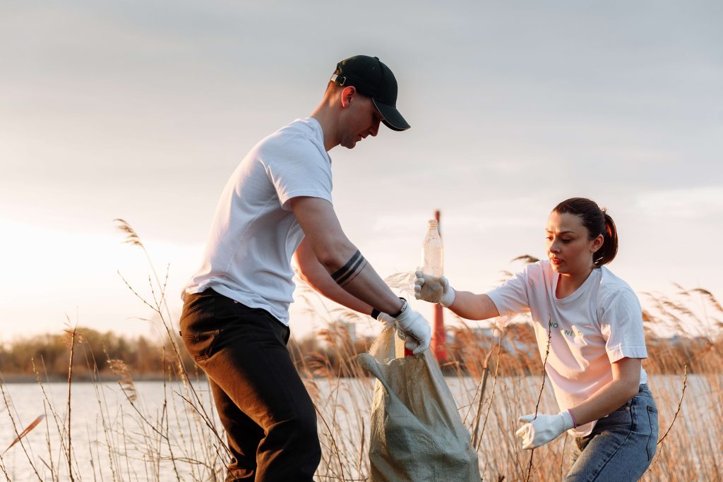 people cleaning up trash