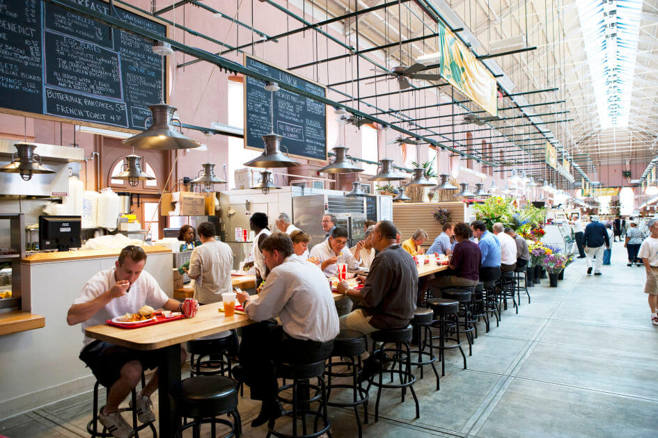 people eating in a food hall