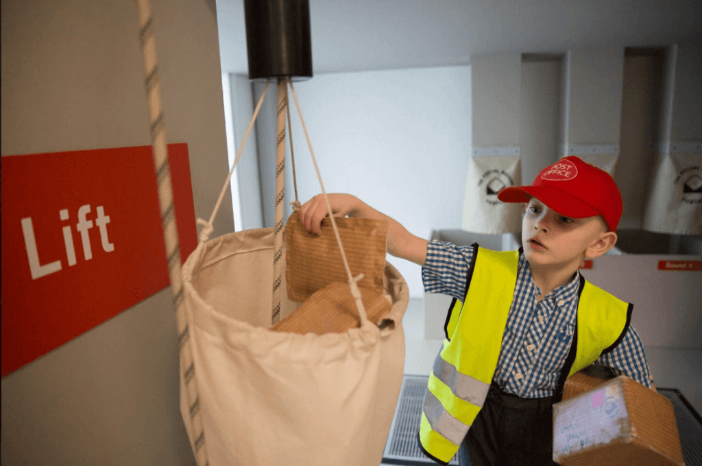 a kid playing as a postman