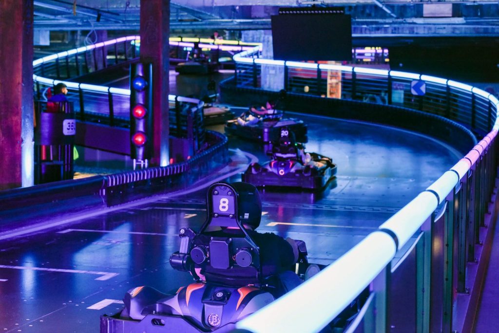 Electric go-karting track at Gravity Karting, London, with karts lined up for an adventurous and fun stag party activity