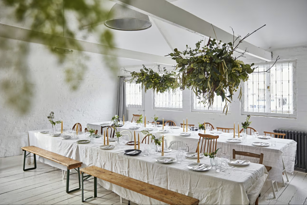 The Studio at Kemble House Studio is a bright space with a touch of industrial chic with white beams and iron wrought burglar bars and brick walls.