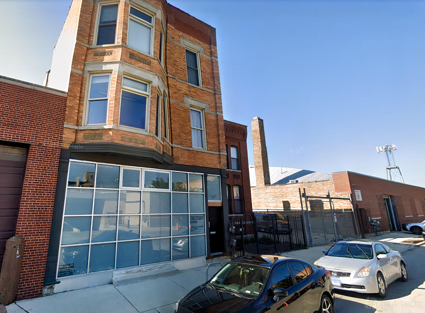 A meeting centre with large front windows and a brick facade at The Study Chicago.