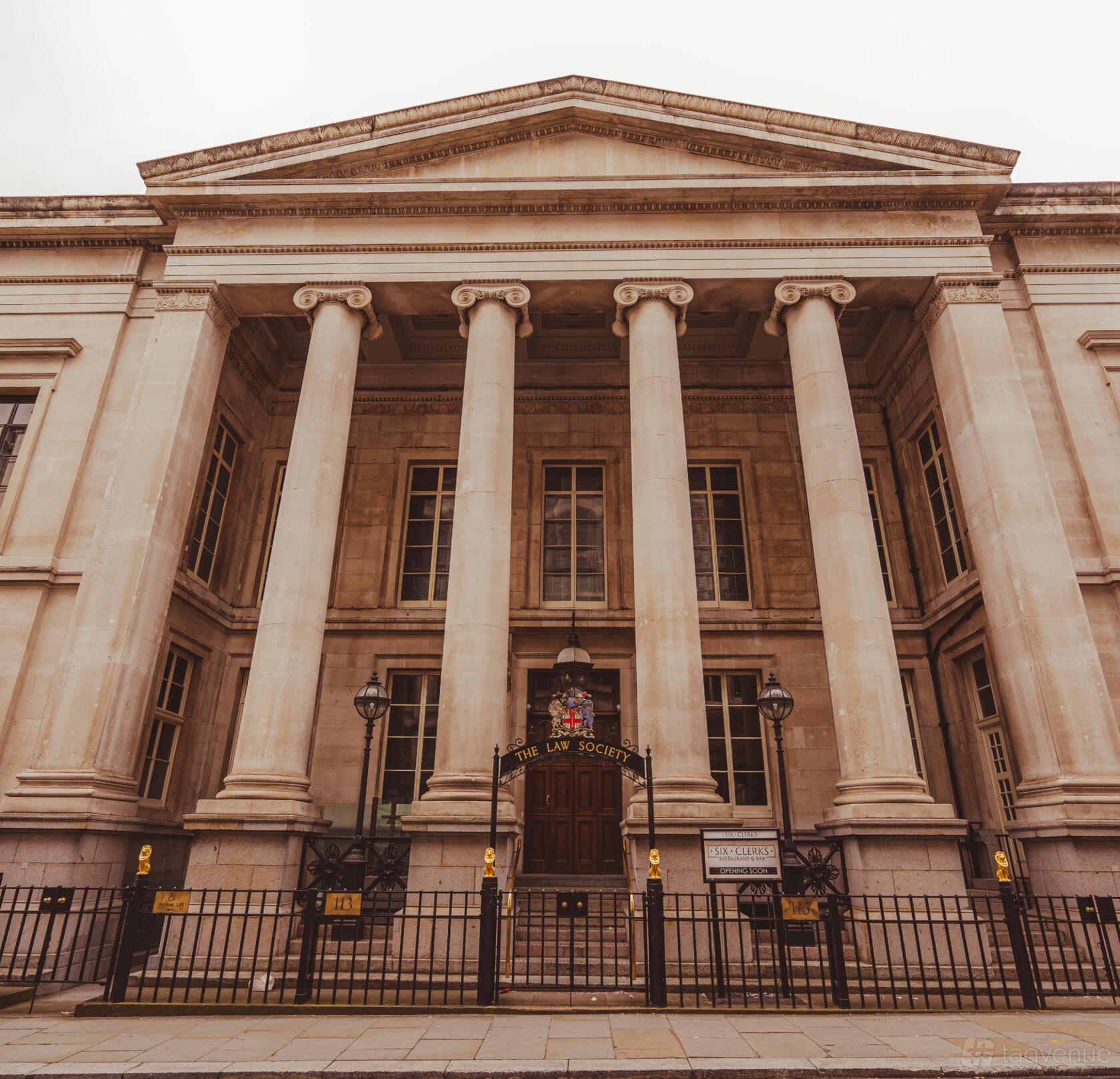 A versatile event space with grand stone columns and an ornate entrance at 113 Chancery Lane.