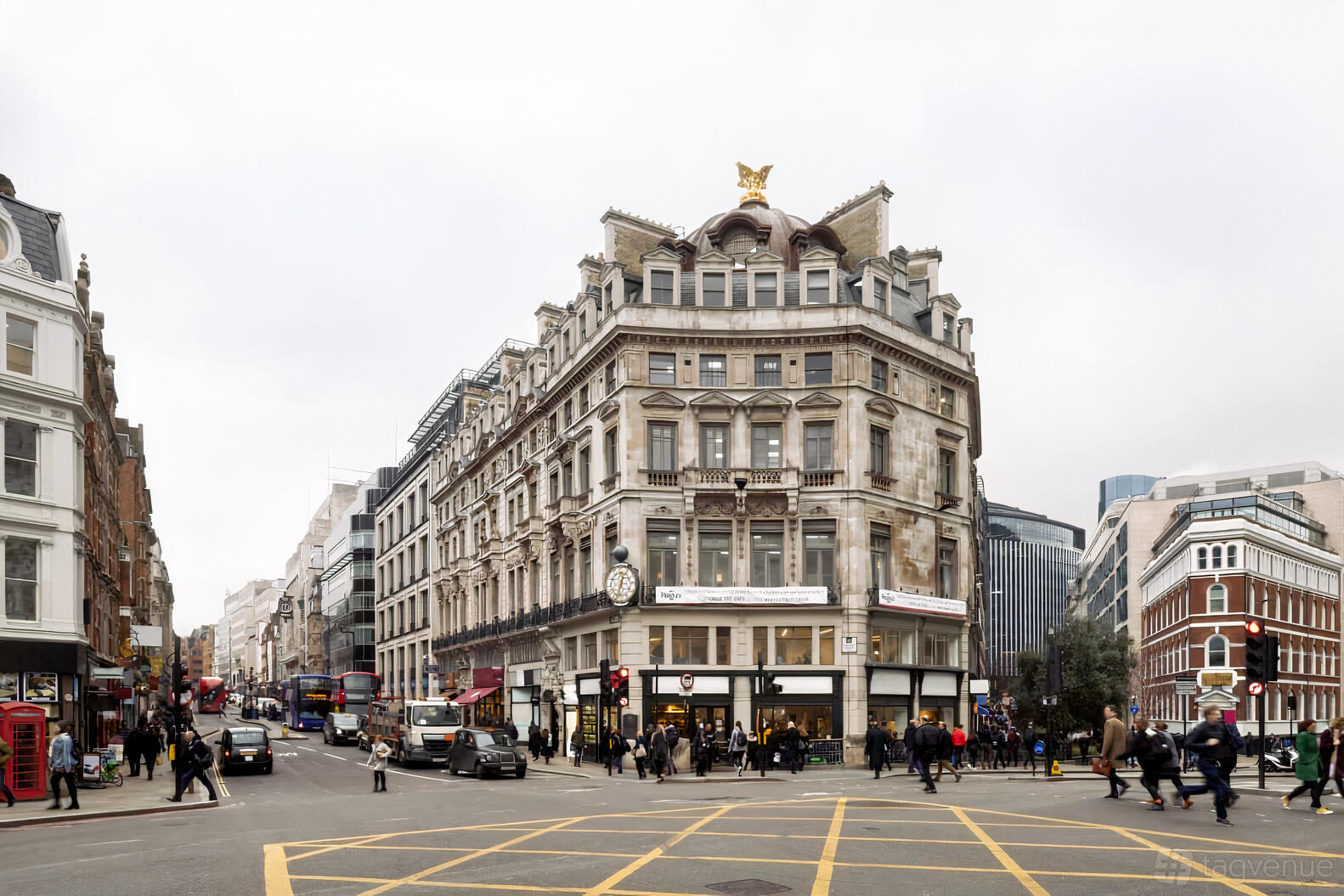 A grand meeting centre with ornate stone facade, corner entrance, and rooftop statue at Regus - London, Fleet Street.