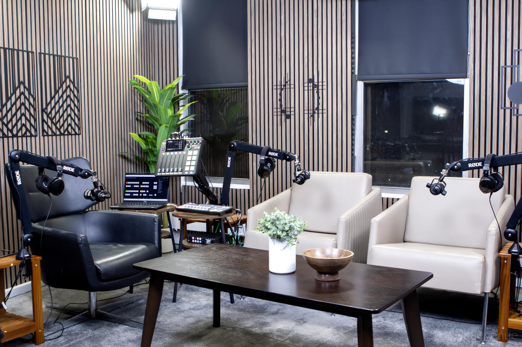 Podcast studio room with seating and production setup