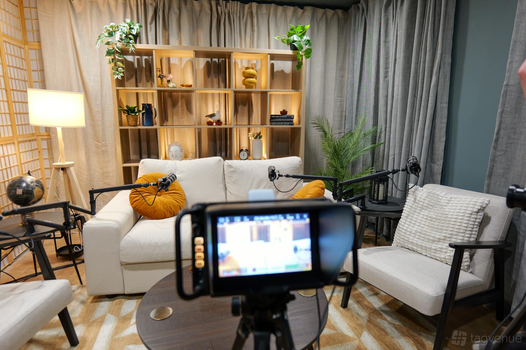 Podcast Room Brighton recording room with chairs, boom microphones and camera