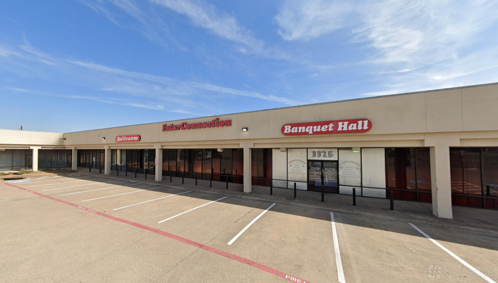A versatile event space with a covered walkway, large windows, and clear venue signage at AS Party and More.