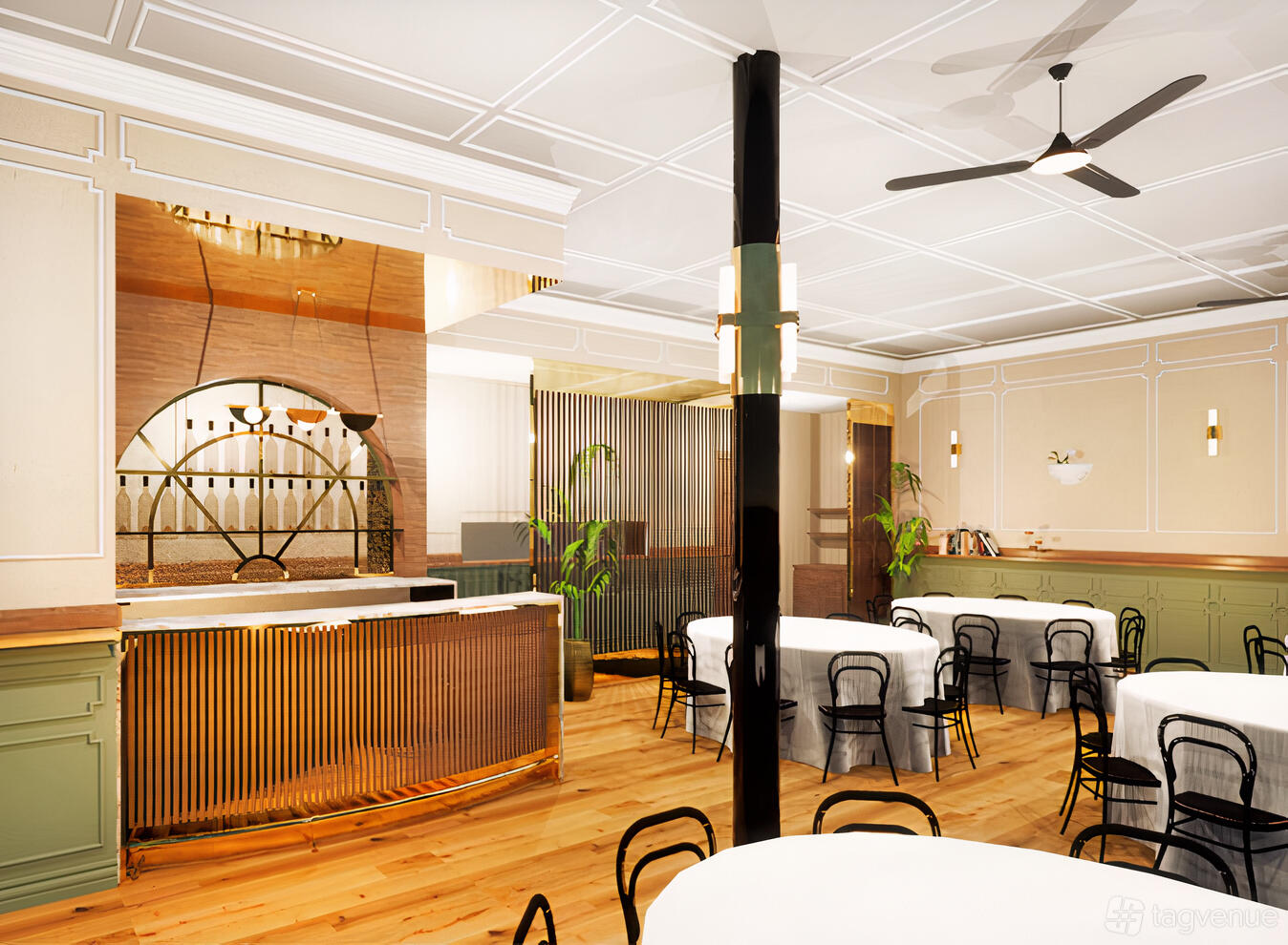 An event venue with round tables, black chairs, wood floors, and brass accents at Grace by Curtis Stone Events.