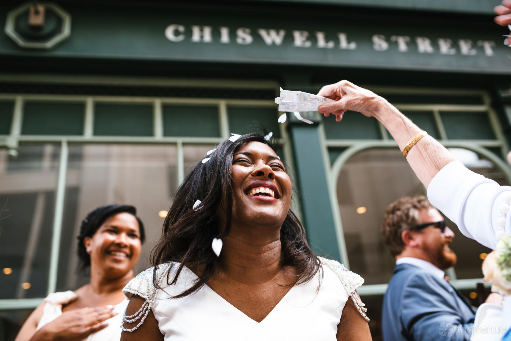 A pub dining room exterior with green painted facade and large street-facing windows at Chiswell Street Dining Rooms.