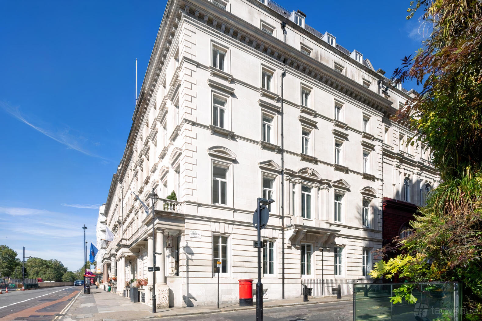 A meeting centre with a grand white stone facade, arched windows, and classical architectural details at The Space - 117 Piccadilly.