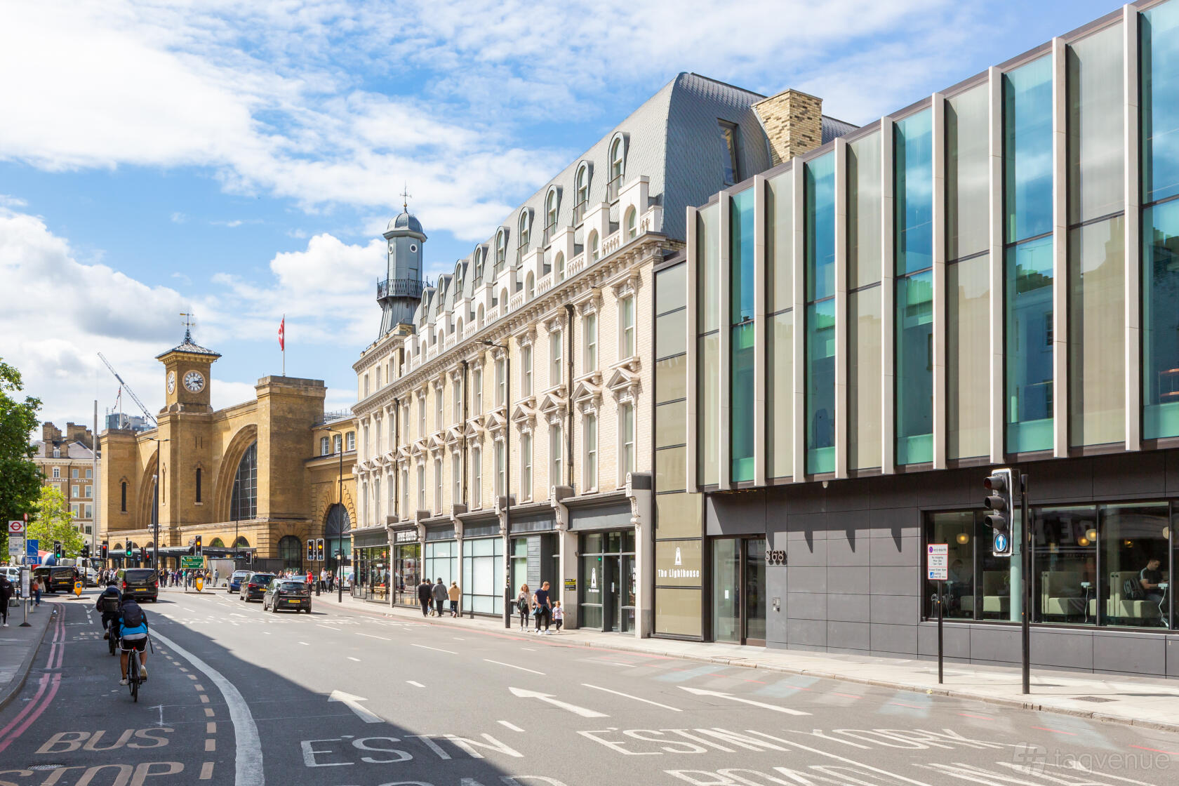 A meeting centre with a modern glass facade and historic stone building near King's Cross at Landmark: Lighthouse, King's Cross, London.