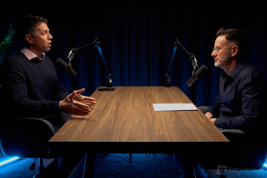 BloodBrother Studios Nottingham podcast conversation with two hosts, table and microphones
