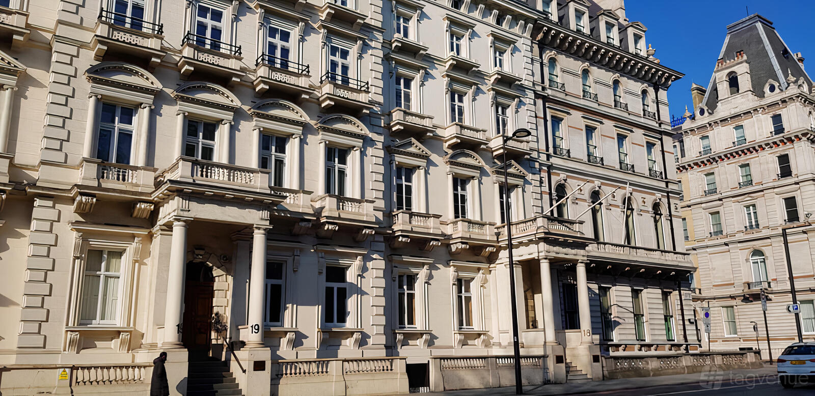 A versatile event space with grand Victorian architecture and tall sash windows at Lumiere London - The Embassy.