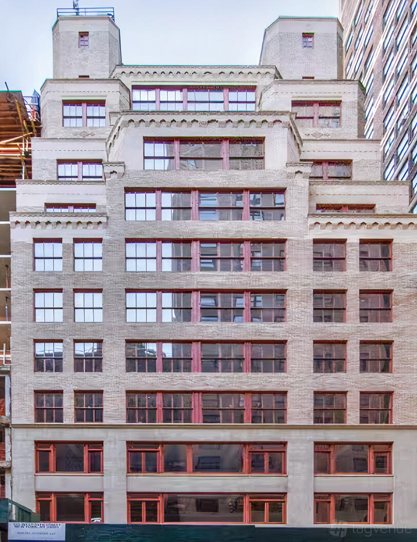 A meeting centre in a multi-story brick building with large industrial-style windows at OASIS by Workville.