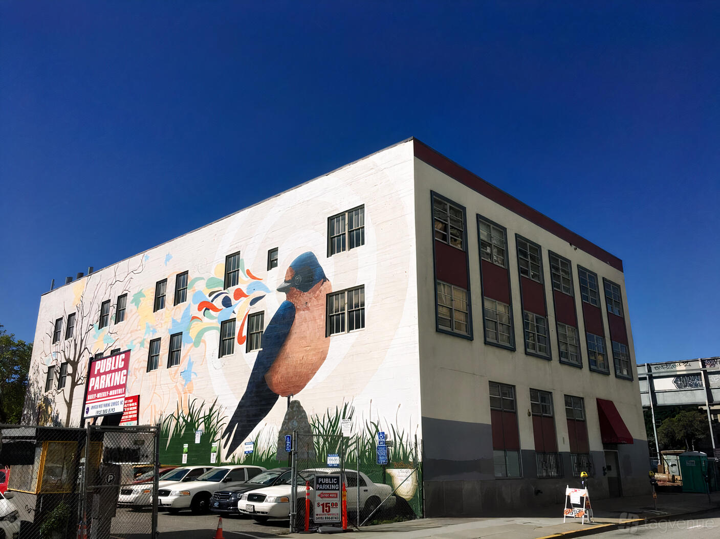 A versatile event space with a large building exterior featuring a colorful bird mural at Anchor.
