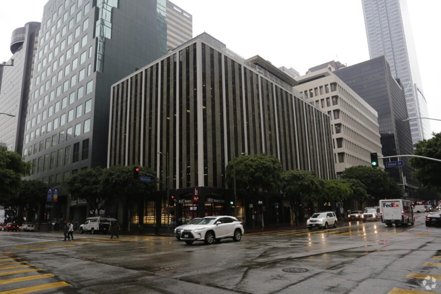 A multi-story event venue with a glass and concrete facade on a city corner at The Top of the Hub.