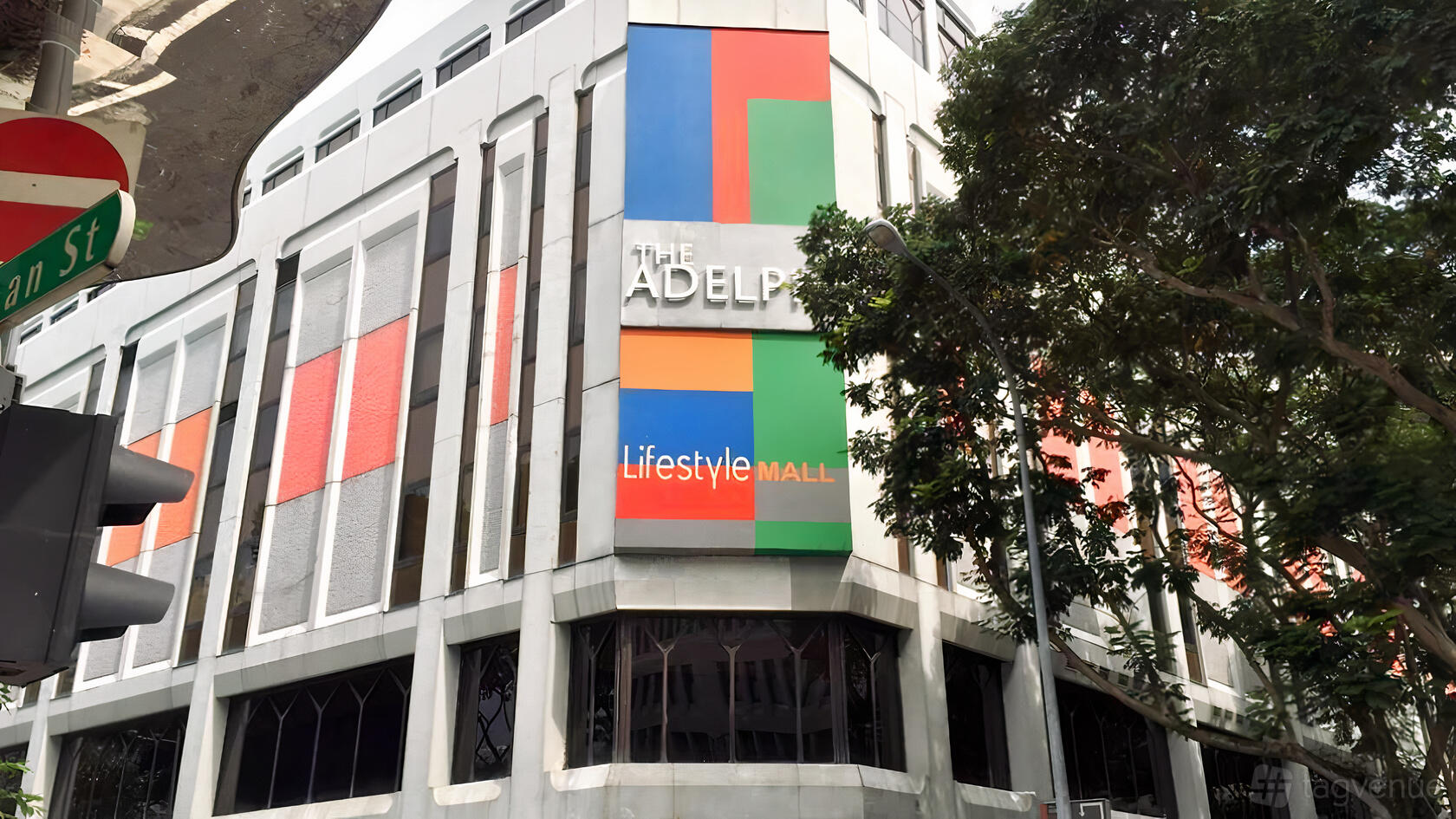 A coworking space in a modern building with large geometric window panels and colorful facade at N9 Offices (City Hall).