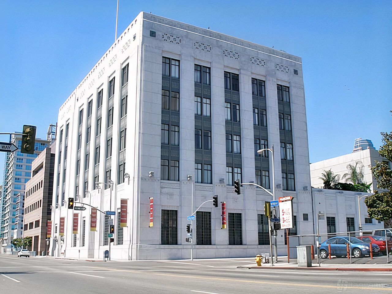 A film and photo studio in a white multi-story corner building with art deco architectural details at JUDE STUDIO LOS ANGELES.