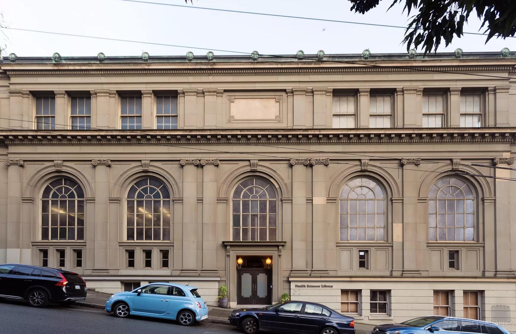 An event venue with large arched windows and classical stone façade at Webster Hall SF.