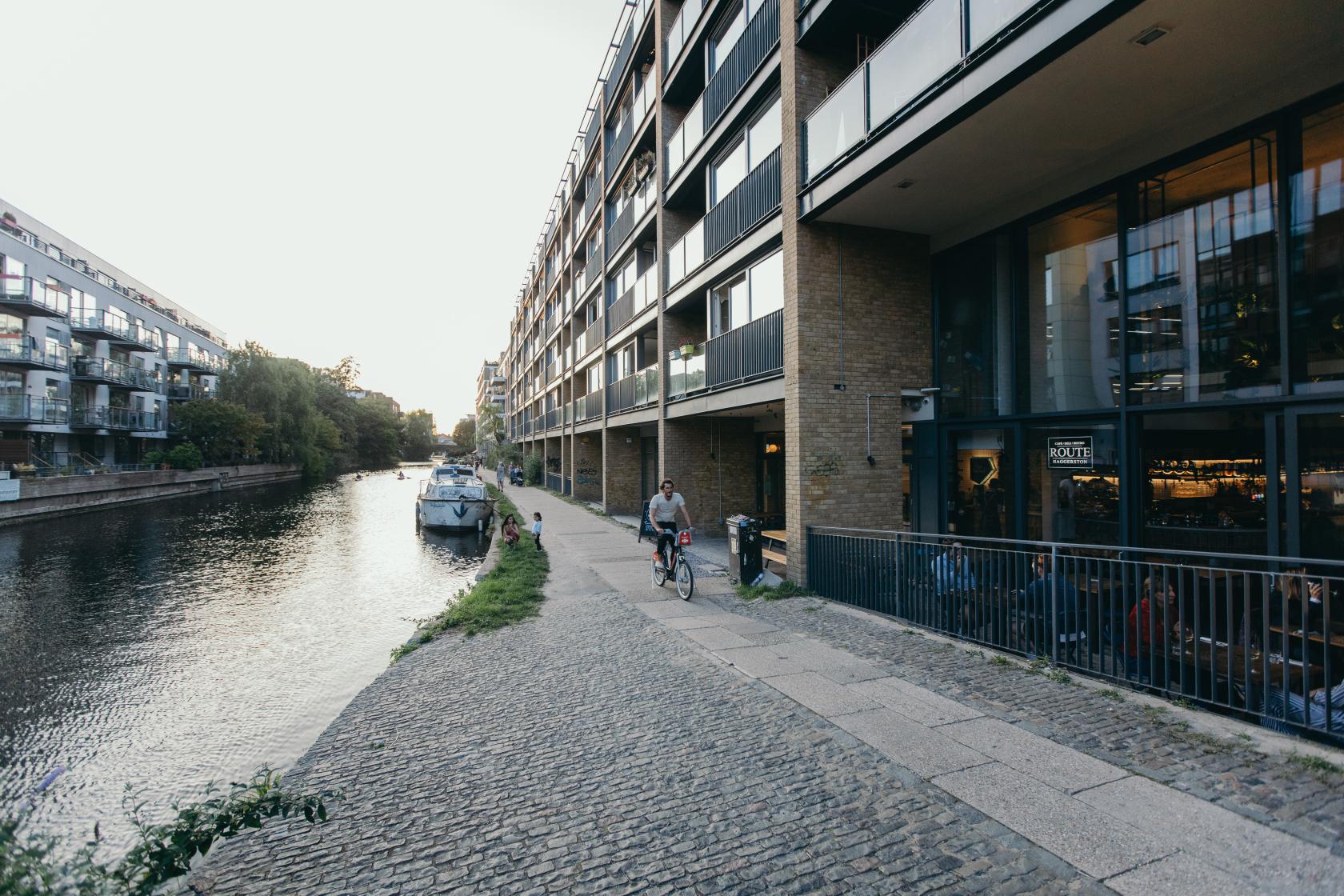 A versatile event space with canal-side access, floor-to-ceiling windows, and brick exterior at The Halley.