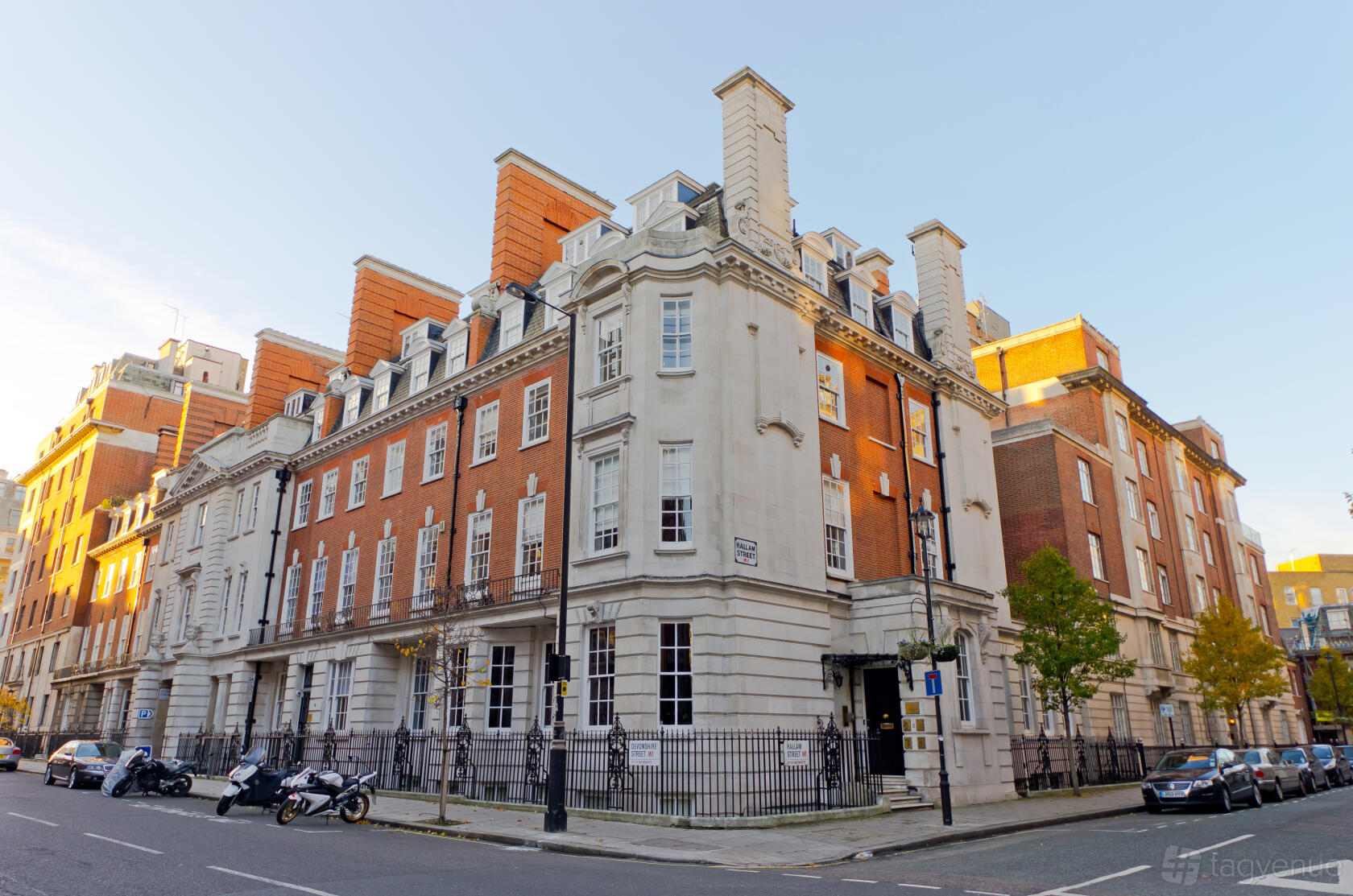 A meeting centre with a red brick facade, large sash windows, and classic stone columns at Landmark: Marylebone, London.