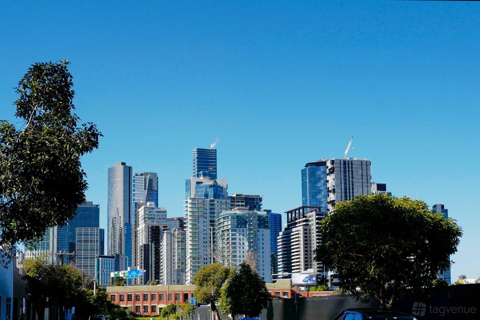 An urban film and photo studio with a city skyline backdrop and clear blue sky at Luminous Studios.