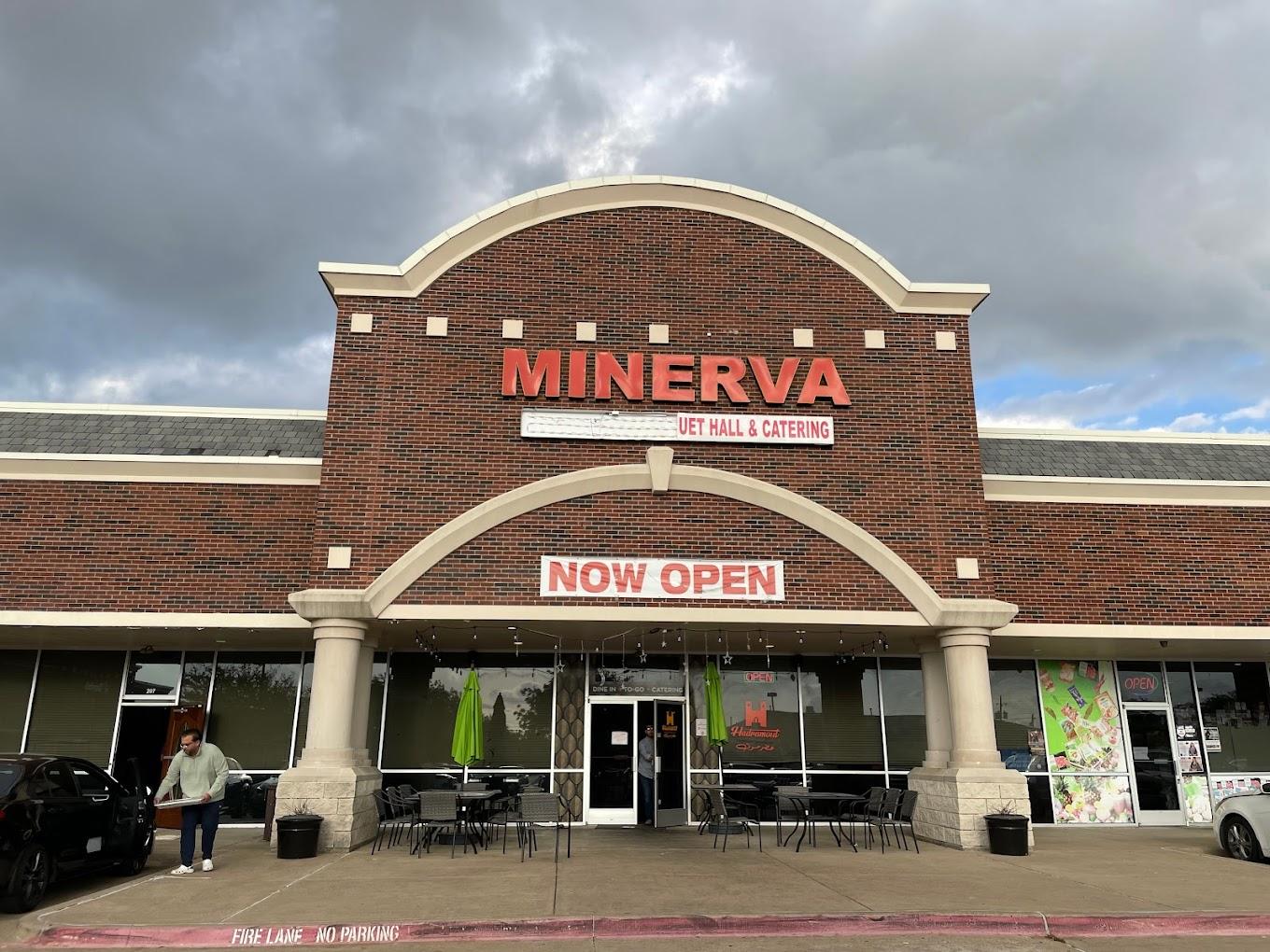 A red brick hall exterior with arched entryway, columns, and large venue signage at Minerva Banquet Hall.