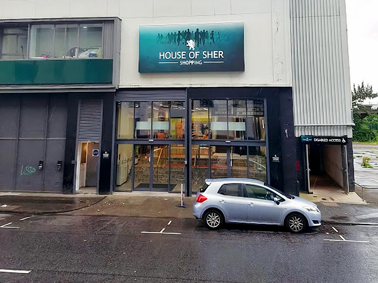 A meeting centre with a glass-front entrance and street-facing signage at Glasgow Rooms.