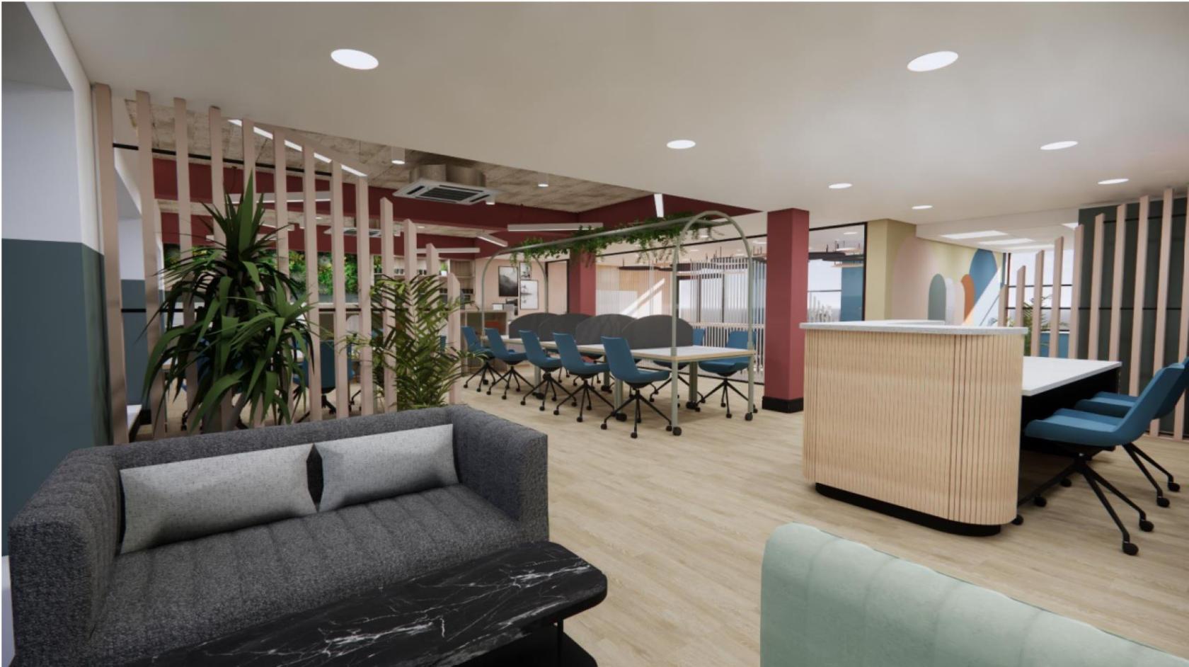 A coworking space with shared desks, blue chairs, indoor plants, and wood flooring at Wizu Workspace - Leeds - 55 St Paul's.