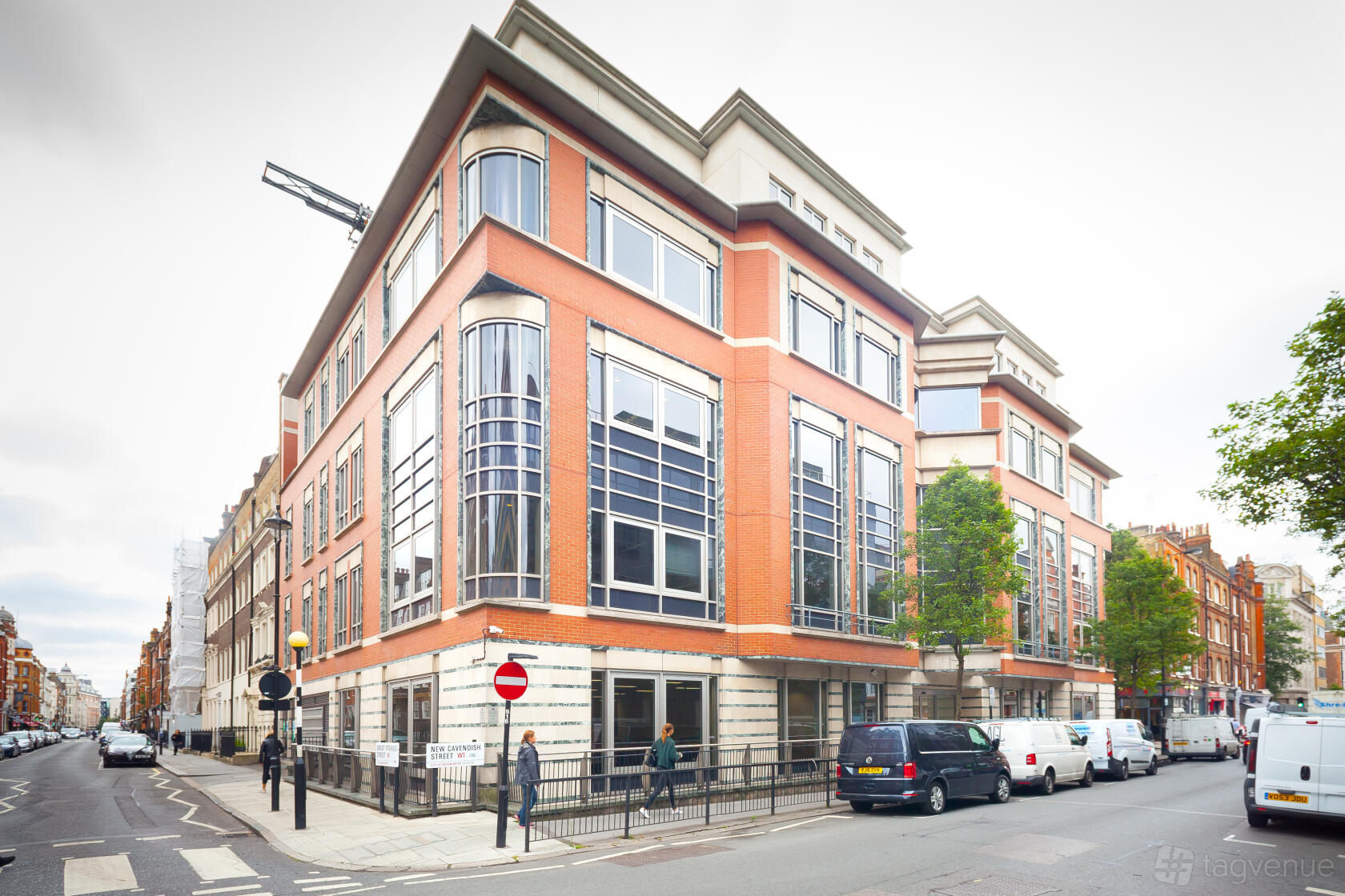 A meeting centre with large corner windows and a red brick facade at Landmark: New Cavendish Street, London.