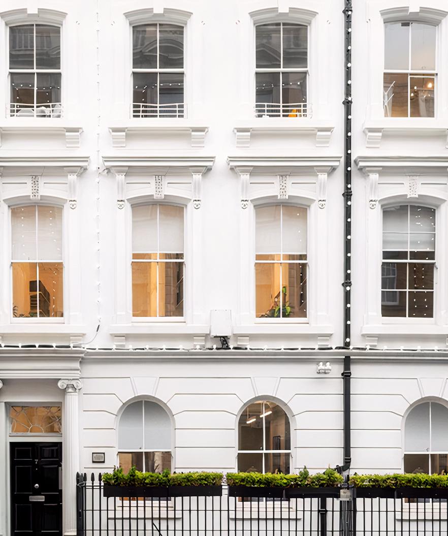 A meeting centre with large sash windows and detailed white facade at Henrietta Street.